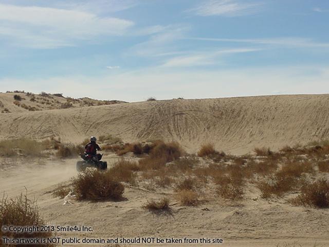 Someone out having fun on their quad in the sand dunes on the far west side of the Rio Rancho Estates by unit 3 just off Southern Boulevard and 60th Street in Sandoval County! This is just down the road from this property for sale. He put on a nice show for me! February 2013!